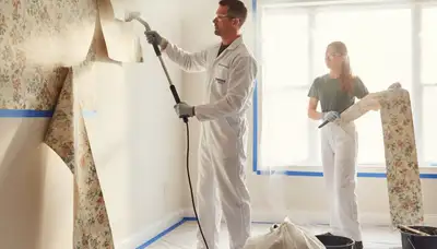 Professional wallpaper removal service in Oakland, CA showing clean wall stripping and surface prep